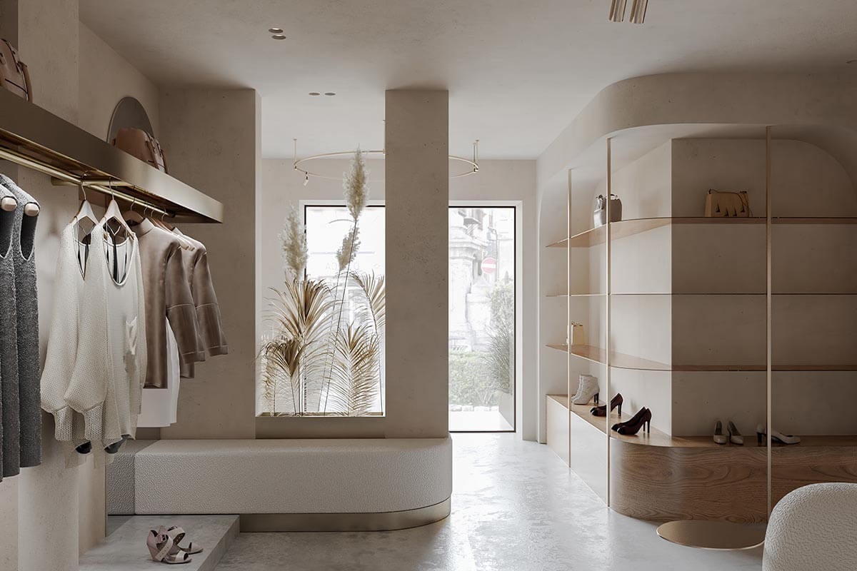Shop quần áo 15m2 phong cách pastel với tường hồng phấn, kệ tròn và đèn vàng ấm Shop quần áo 15m2 phong cách pastel với tường hồng phấn, kệ tròn và đèn vàng ấm