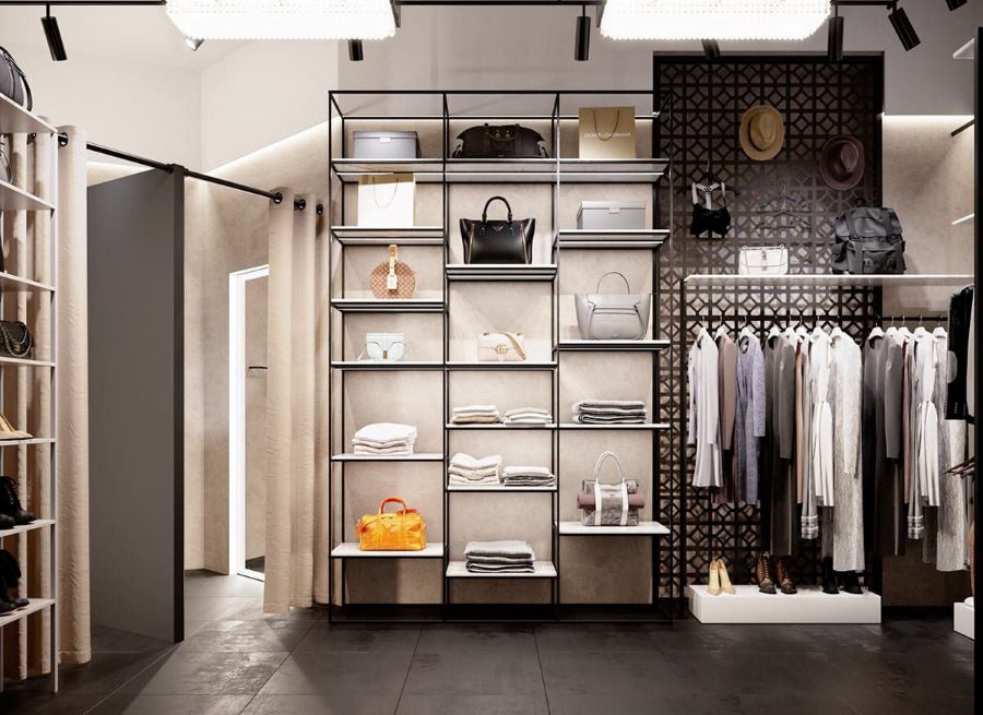Shop quần áo 40m2 phong cách tối giản với kệ gỗ trắng và giá treo kim loại gọn gàng. Shop quần áo 40m2 phong cách tối giản với kệ gỗ trắng và giá treo kim loại gọn gàng.